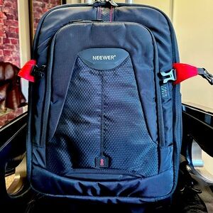 A backpack for a professional photographer. There's space for lenses